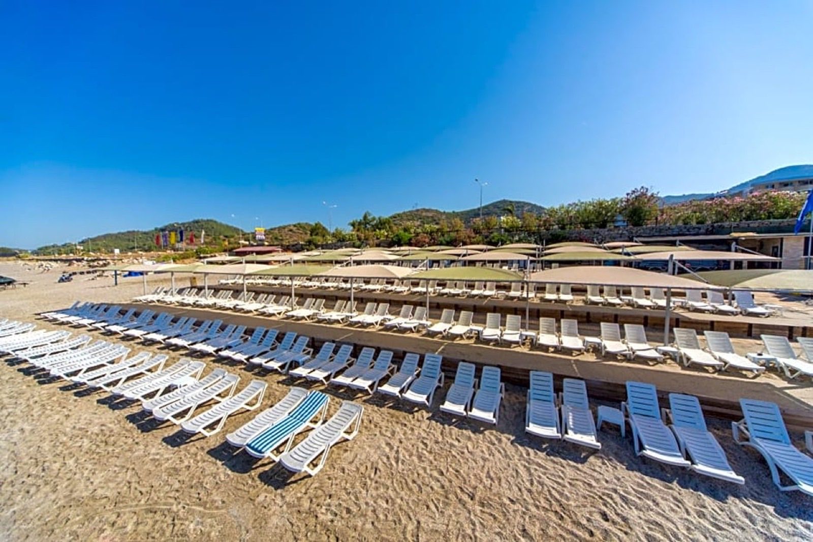 Rows of loungers along the sand at Konaklı